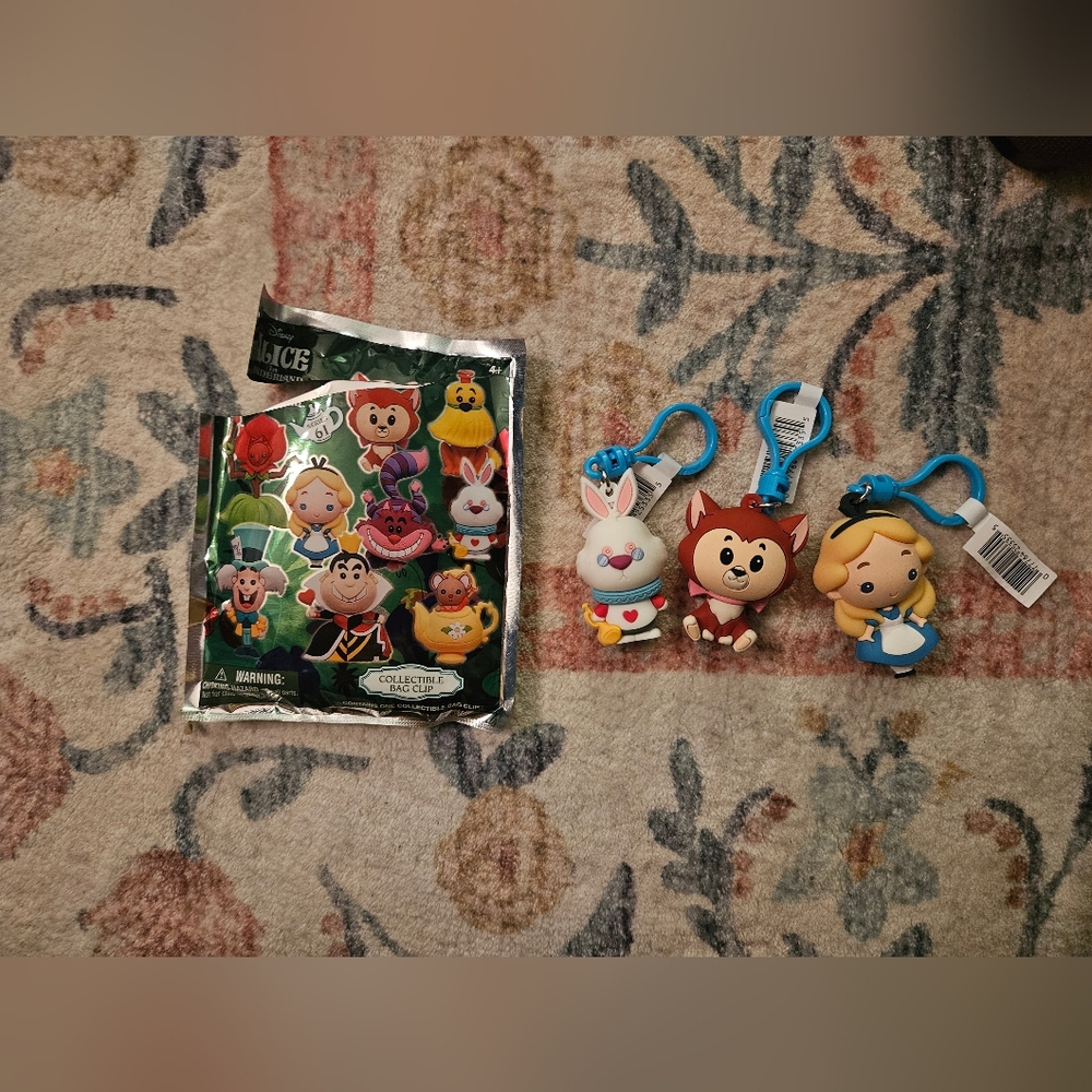 3 Alice In Wonderland Keychains From Blond Bag